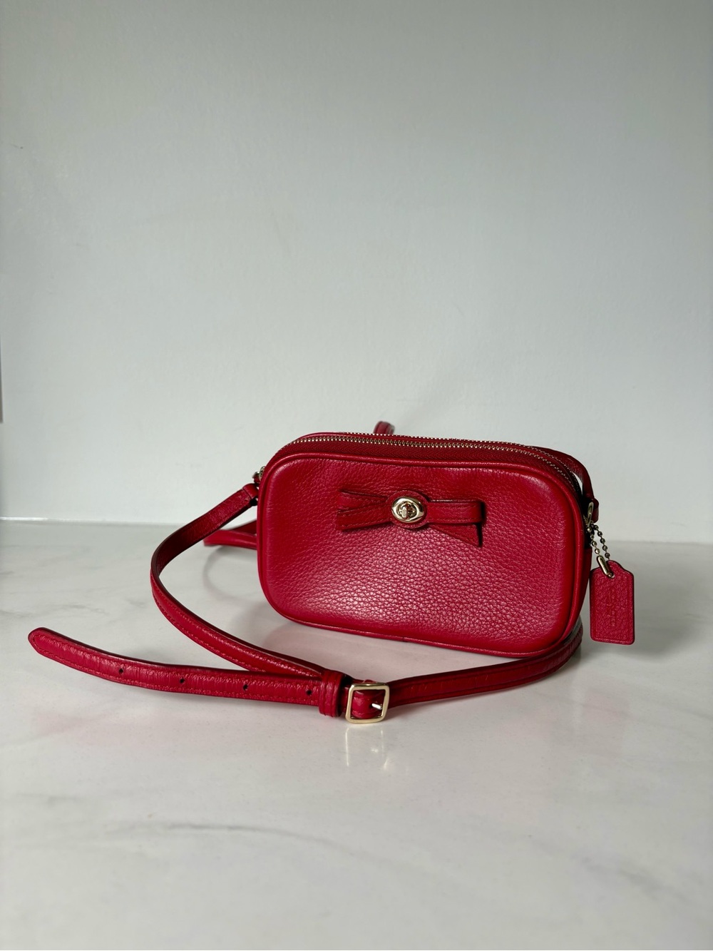 COACH Turnlock Bow Crossbody Pouch | F64248